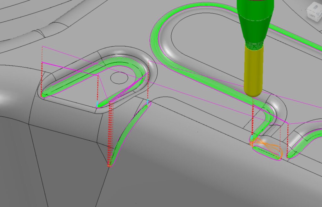Image shows Rest Finishing toolpath machining corners on a press tool .
