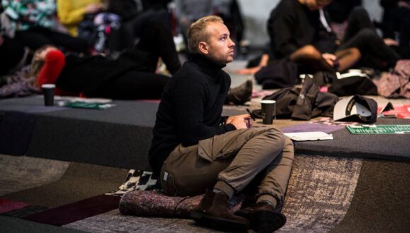 Architecture student paying attention at a conference