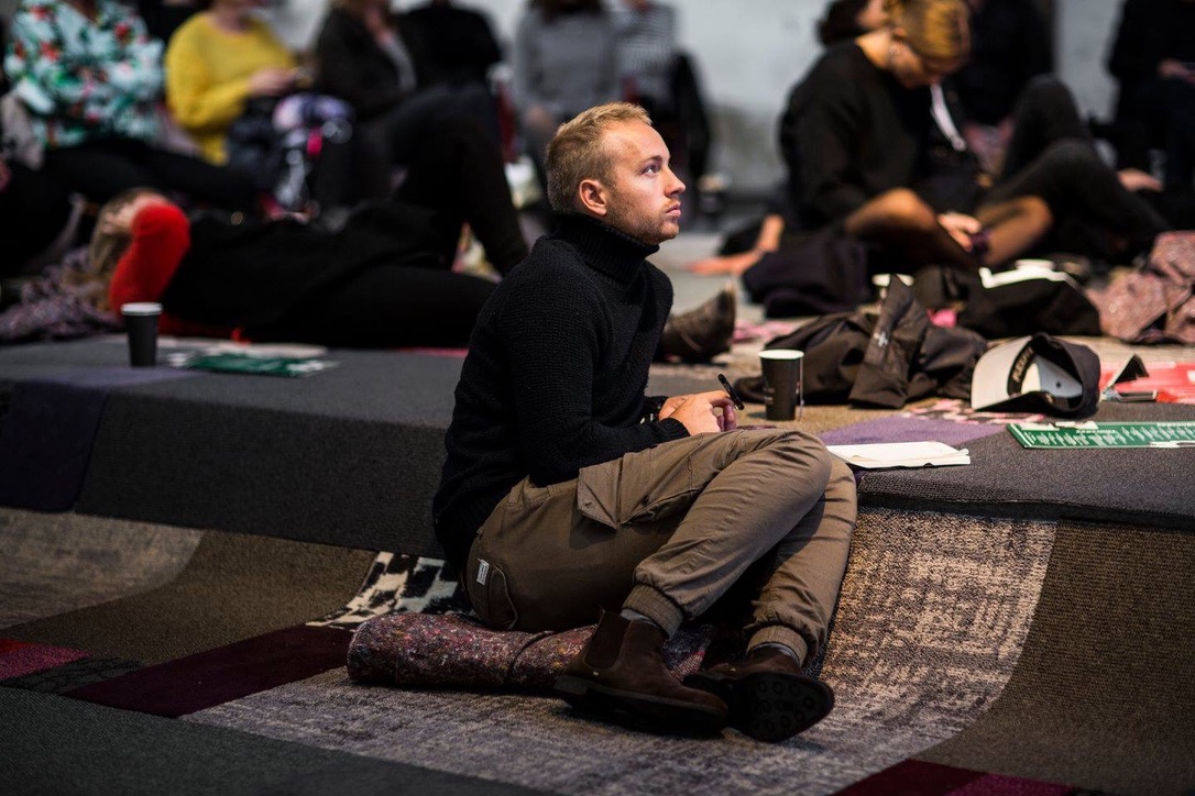 Architecture student paying attention at a conference