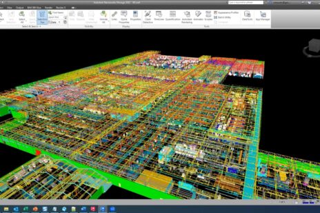 Screenshot of a Zoom webinar with three presenters sharing a large-scale factory model in Navisworks software