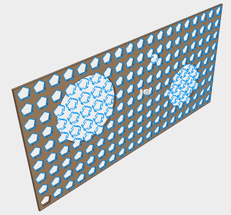 A feature being patterned across a flat panel modelled in Autodesk Inventor
