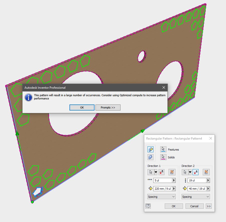 A feature being patterned across a flat panel modelled in Autodesk Inventor. A message warns that the inputs will result in a large number of patterns, and suggests use of Optimized compute.