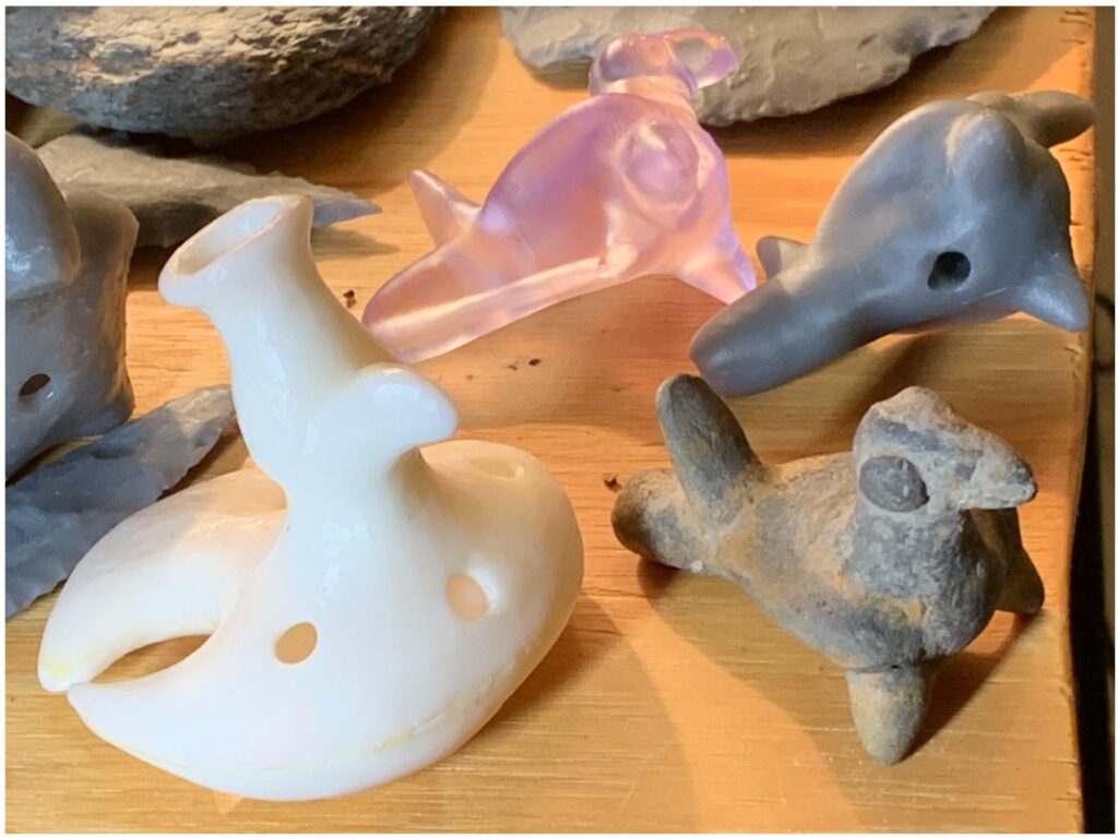 Original whistle (bottom right) and two 3D printed replicas using Formlabs Draft Resin and Biomed Clear Resin.