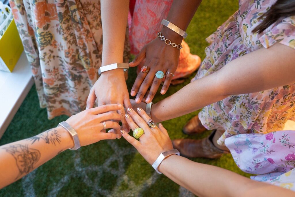 UT students model their men’s bracelet design