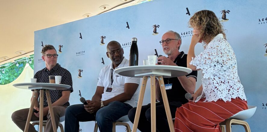 4 panelists discussing AI in animation on stage at Annecy 2026