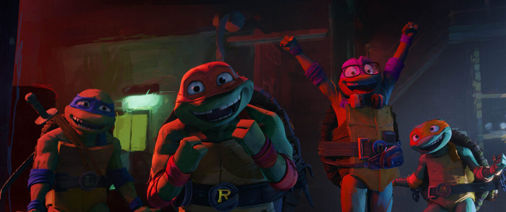 Leonardo, Donatello, Raphael and Michelangelo, the four anthropomorphic turtle brothers from 'Teenage Mutant Ninja Turtles: Mutant Mayhem' celebrating 