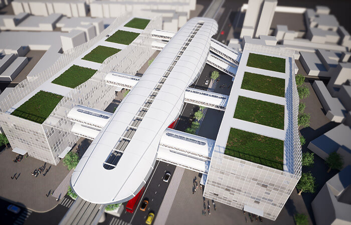 Uma vista aérea da estação com passagens de pedestres elevadas. Cortesia da BEM/FDN