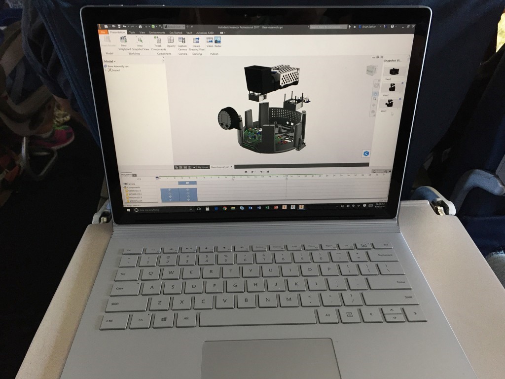 Microsoft Surface laptop open with Autodesk Inventor open on it.